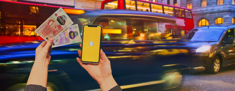 Great British Pounds and phone opened on Snapchat app