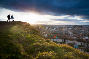 Travellers at top of hill in Edinburgh