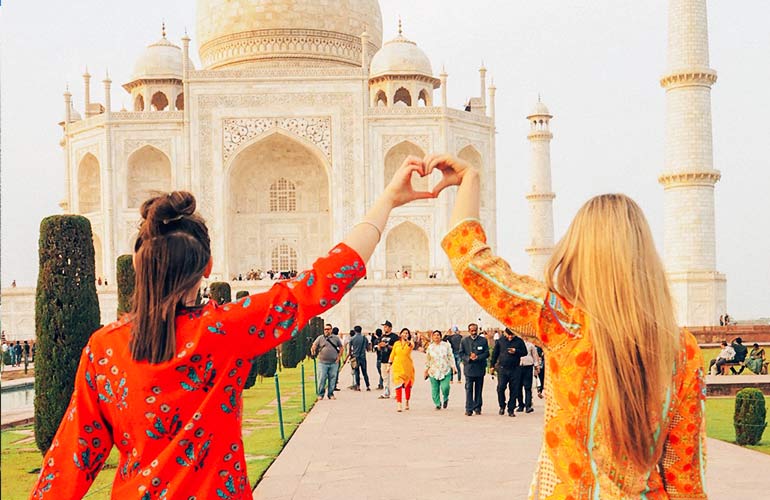 Girls in front of Taj Mahal