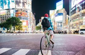 Boy on bike in Tokyo
