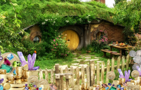 LOTR Hobbiton with jewels and treasure Travel New Zealand Rings of Power inspired blog Travel Money 