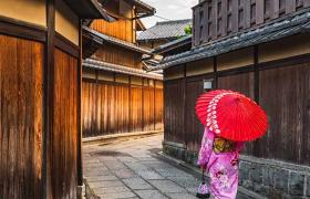 lady walking through street japan